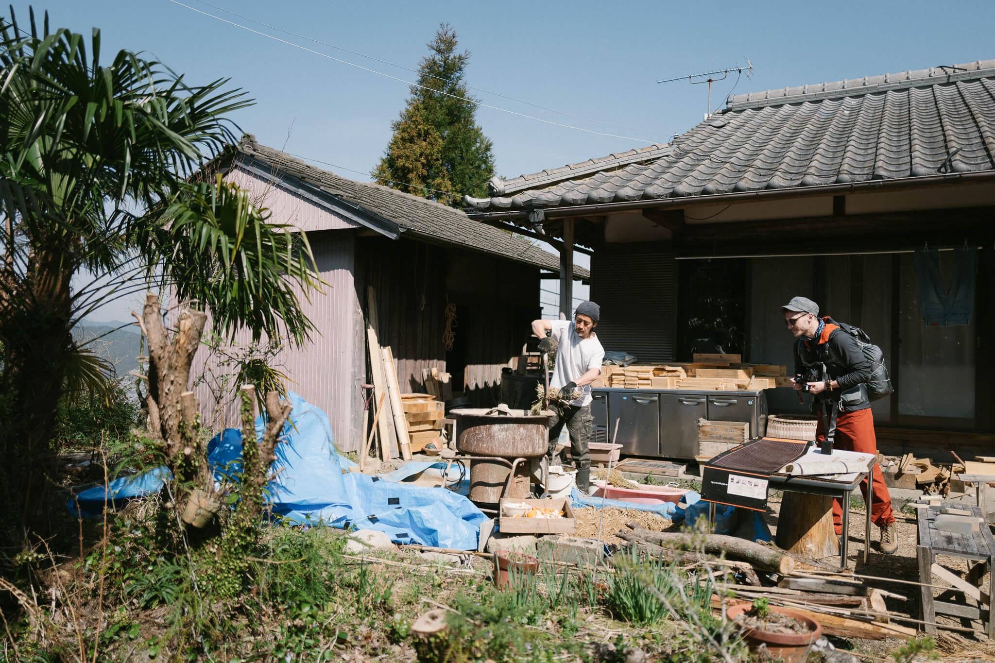 Mixing clay for walls of a soon-to-be onigiri shop just outside of Takahara