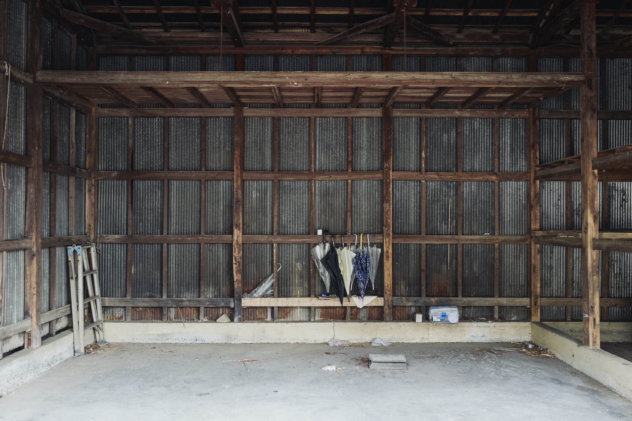 Umbrellas in a wooden garage