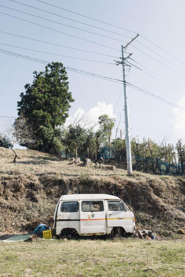 A discarded van with no wheels along Kumano Kodo