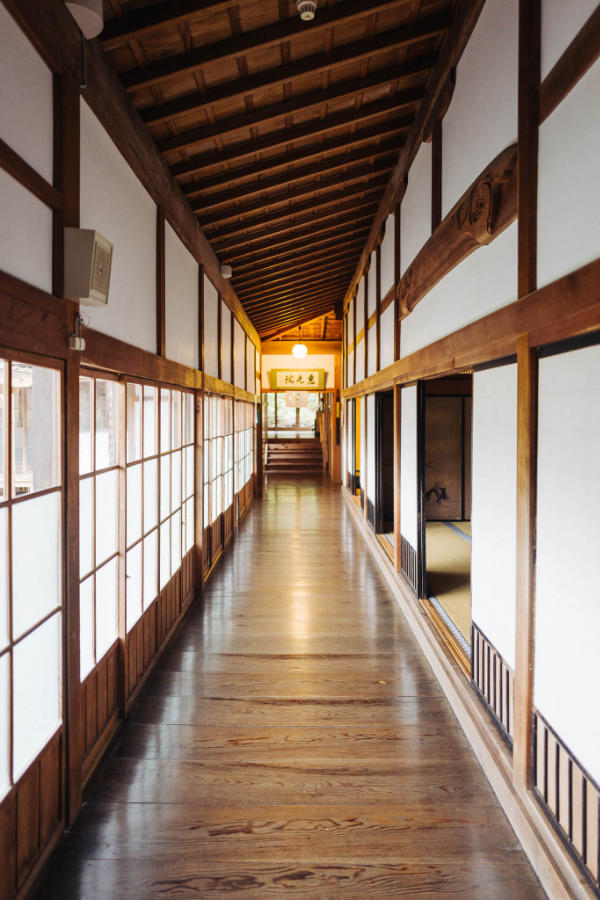 A hallway in the morning light on the way to prayers at Eiko-in Temple on Koya-san